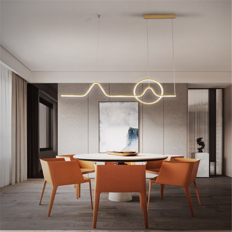 Bronze linear chandelier installed over dining area N-Lighten